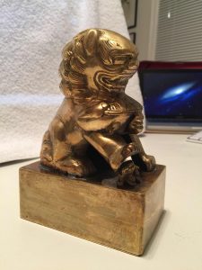 shiny brass statue of chinese foo dog - this downloadable image is for student use in scratchboard class.