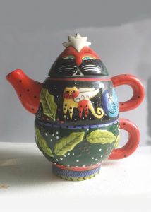 festively-colored cat-headed teapot - this downloadable image is for student use in scratchboard class.