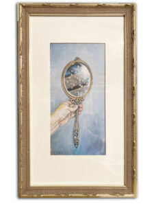 A woman's hand holding up an ornate mirror with a spotted reflection.